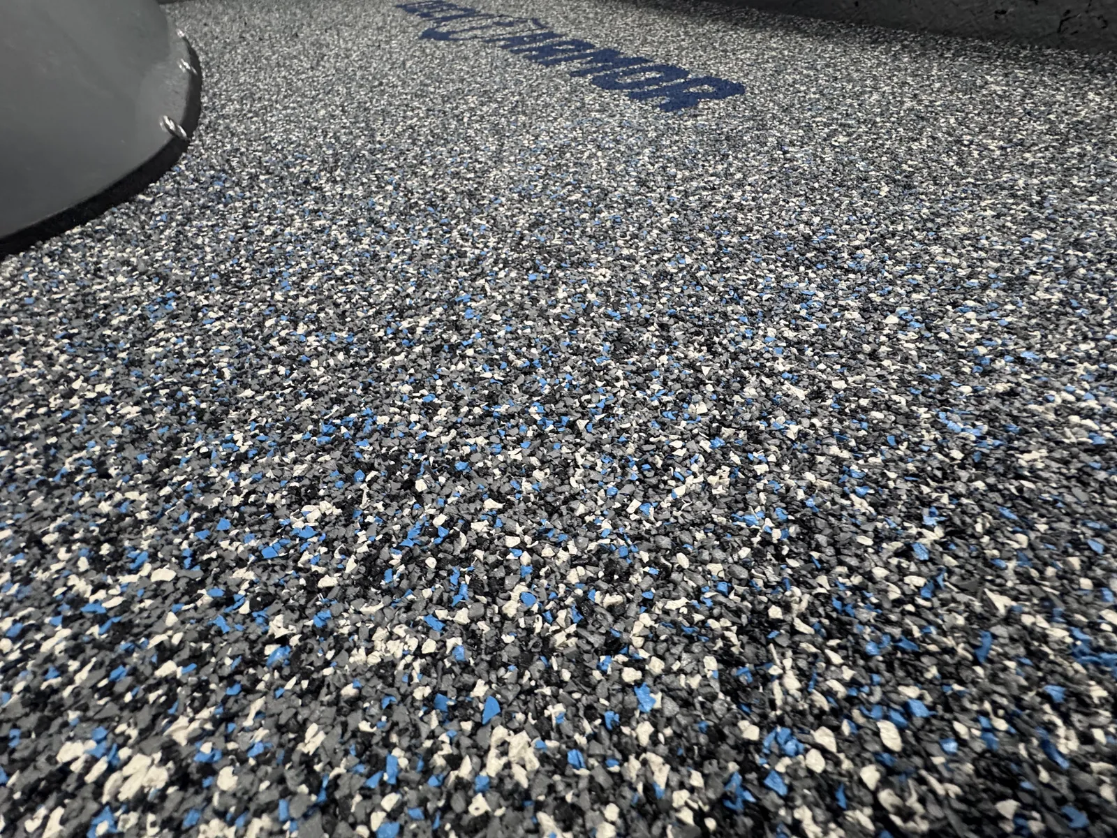 Close-up of the bonded Deck Armor rubber flooring surface